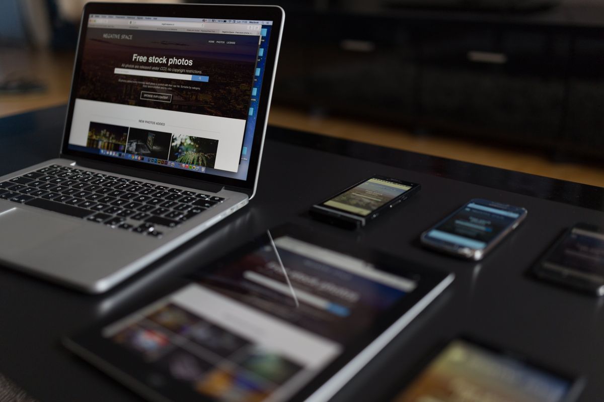 Laptop, tablet and smartphones on a desk