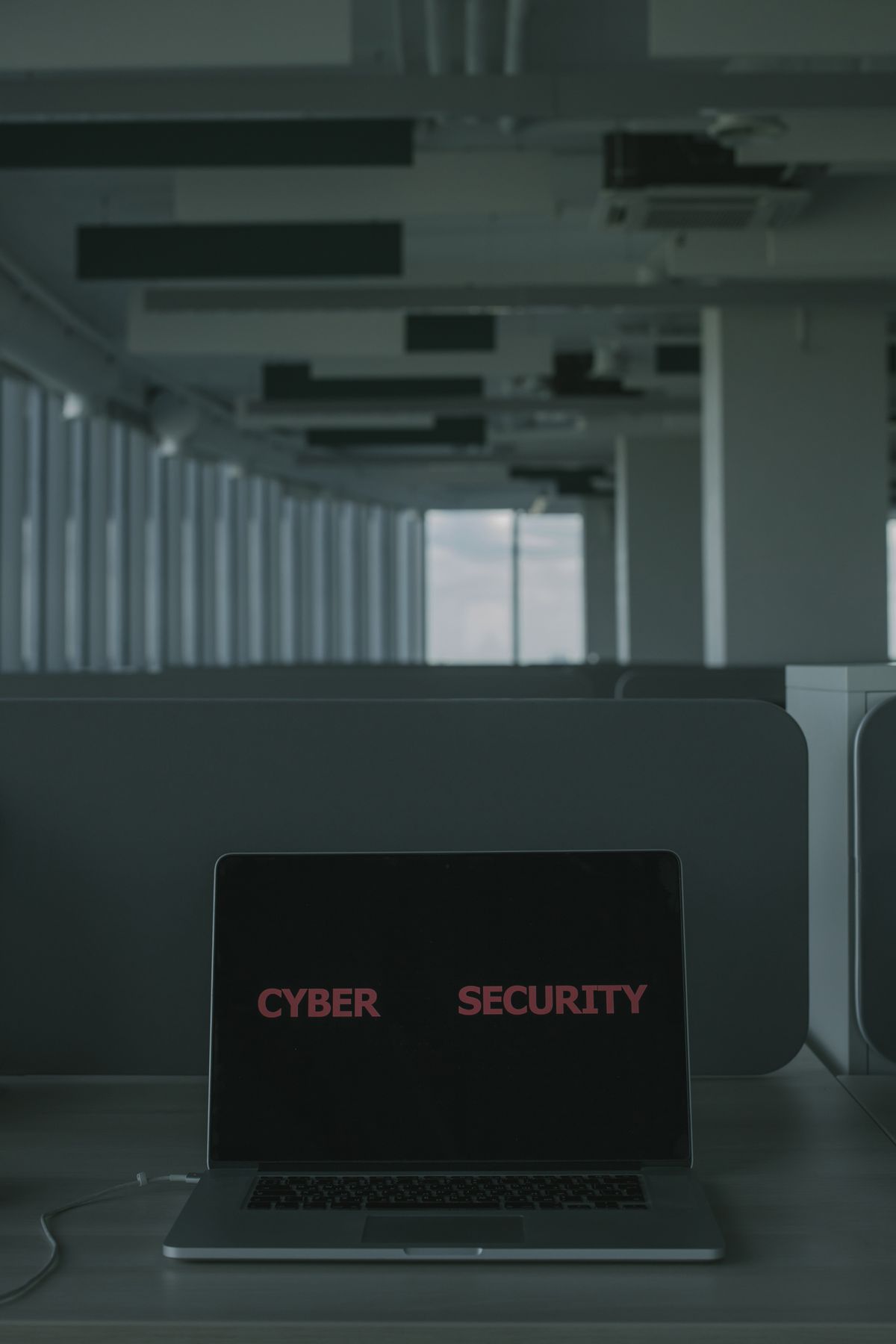 Laptop displaying cyber security on screen