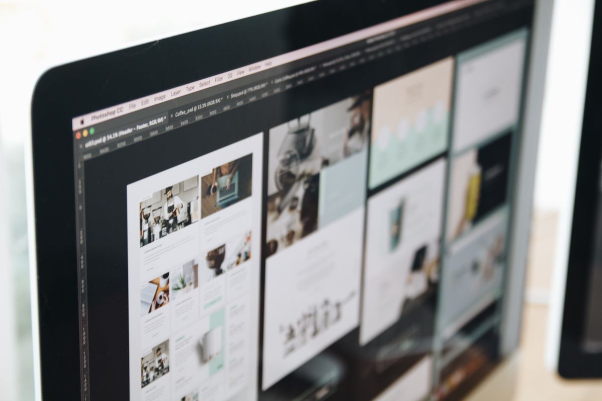 Computer screen showing website design work
